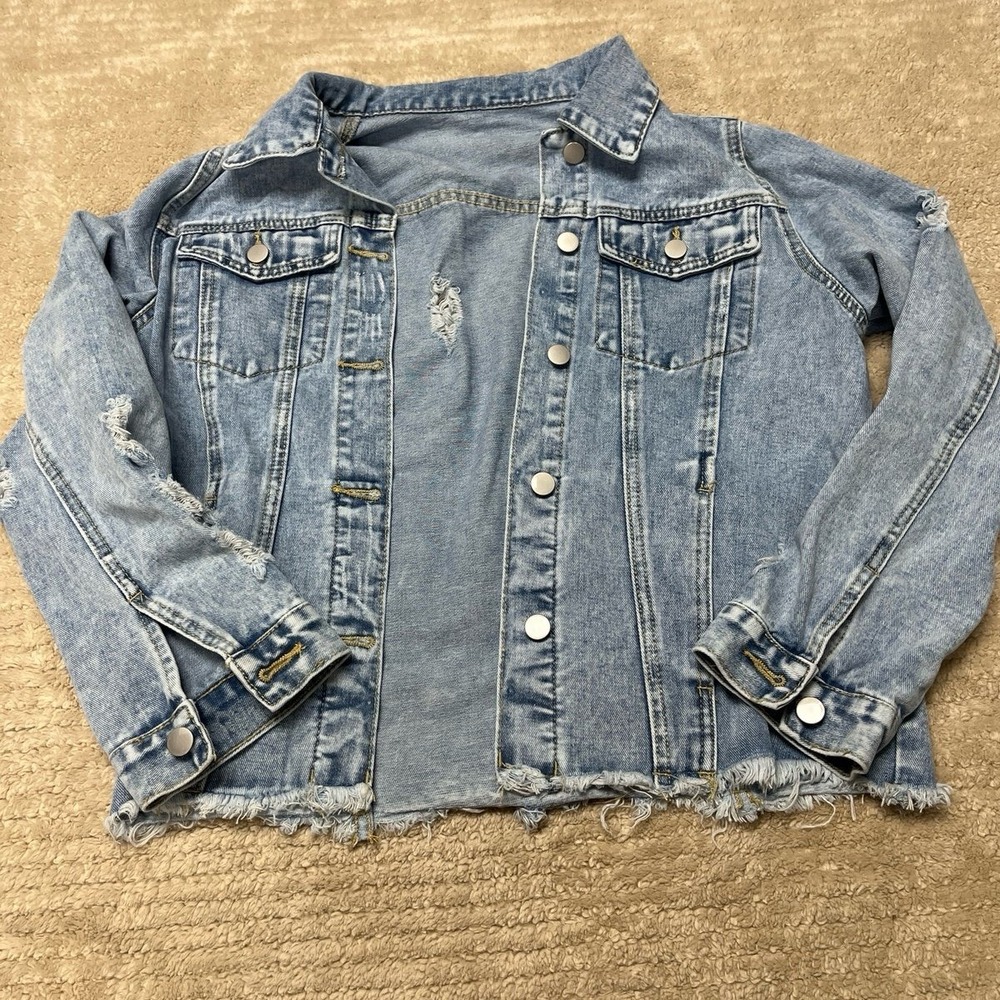 Distressed Denim Jacket in size medium